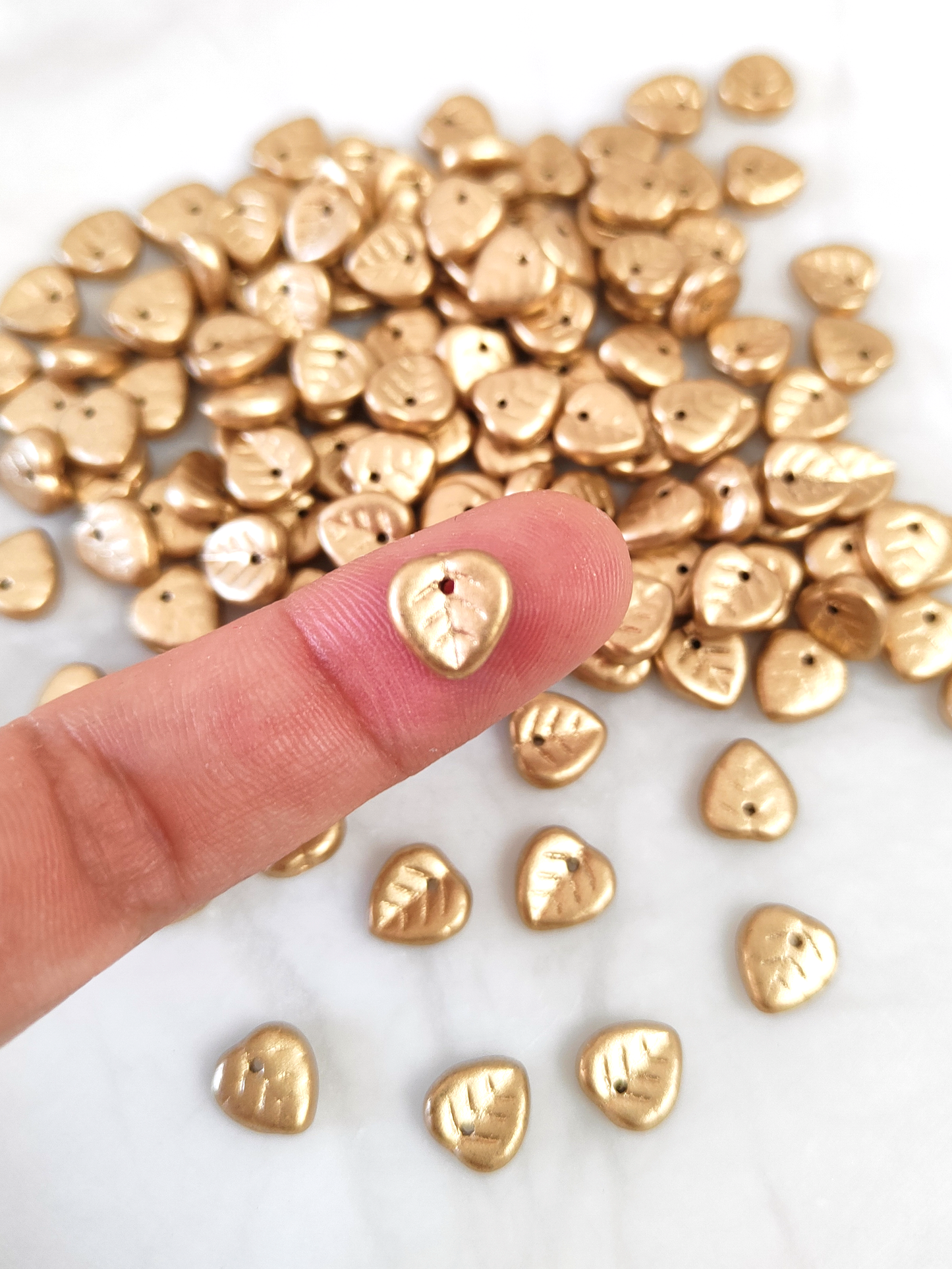 Lindenblätter 9mm - matt Gold