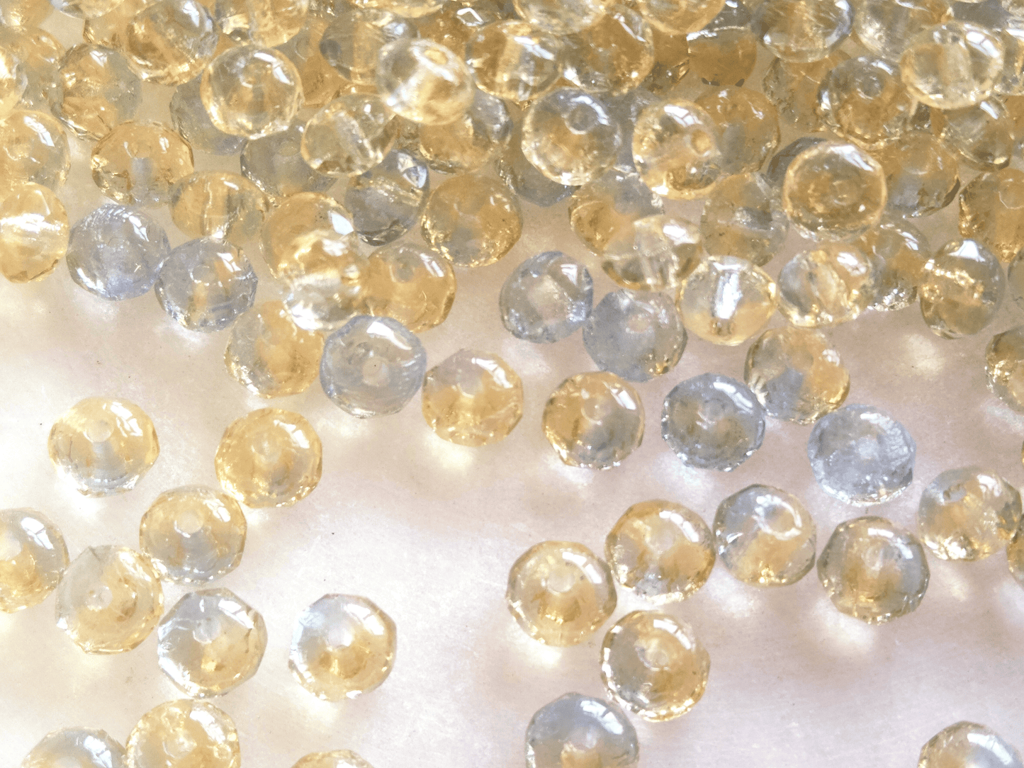 Faceted rondelle beads 3x5mm - light yellow & blue