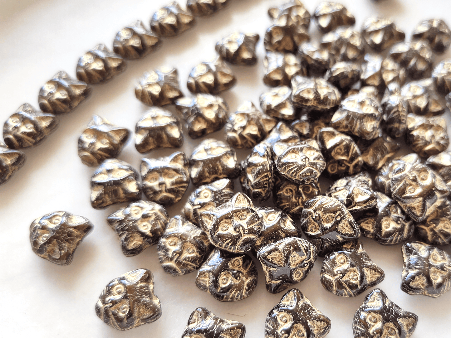 Katzengesichter 13mm - Schwarz & Gold