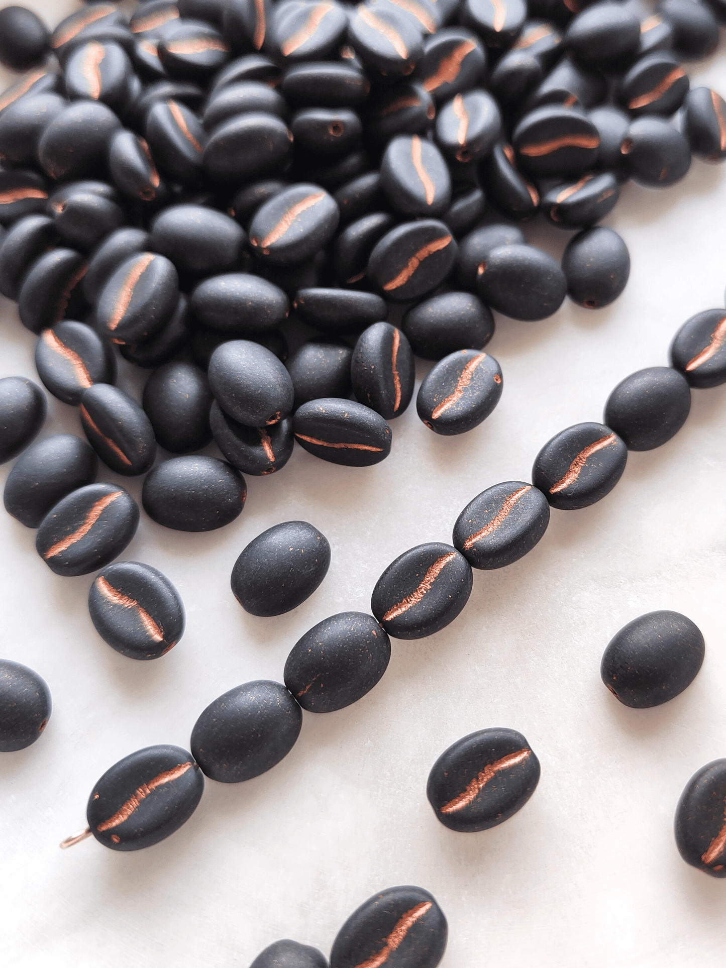 Coffee bean beads 11x8mm - matt black & copper