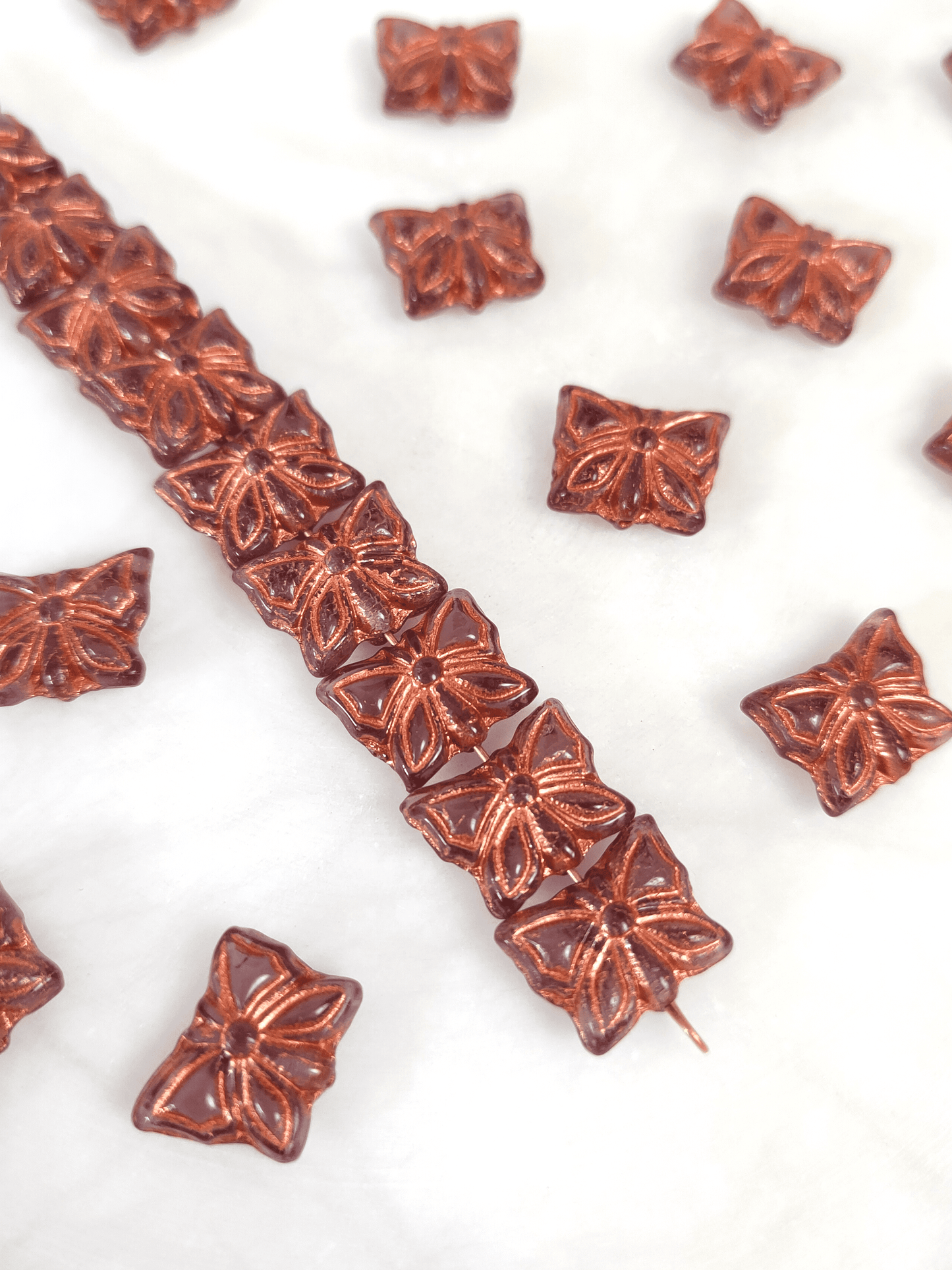 Butterfly beads 15x12mm - brown & orange