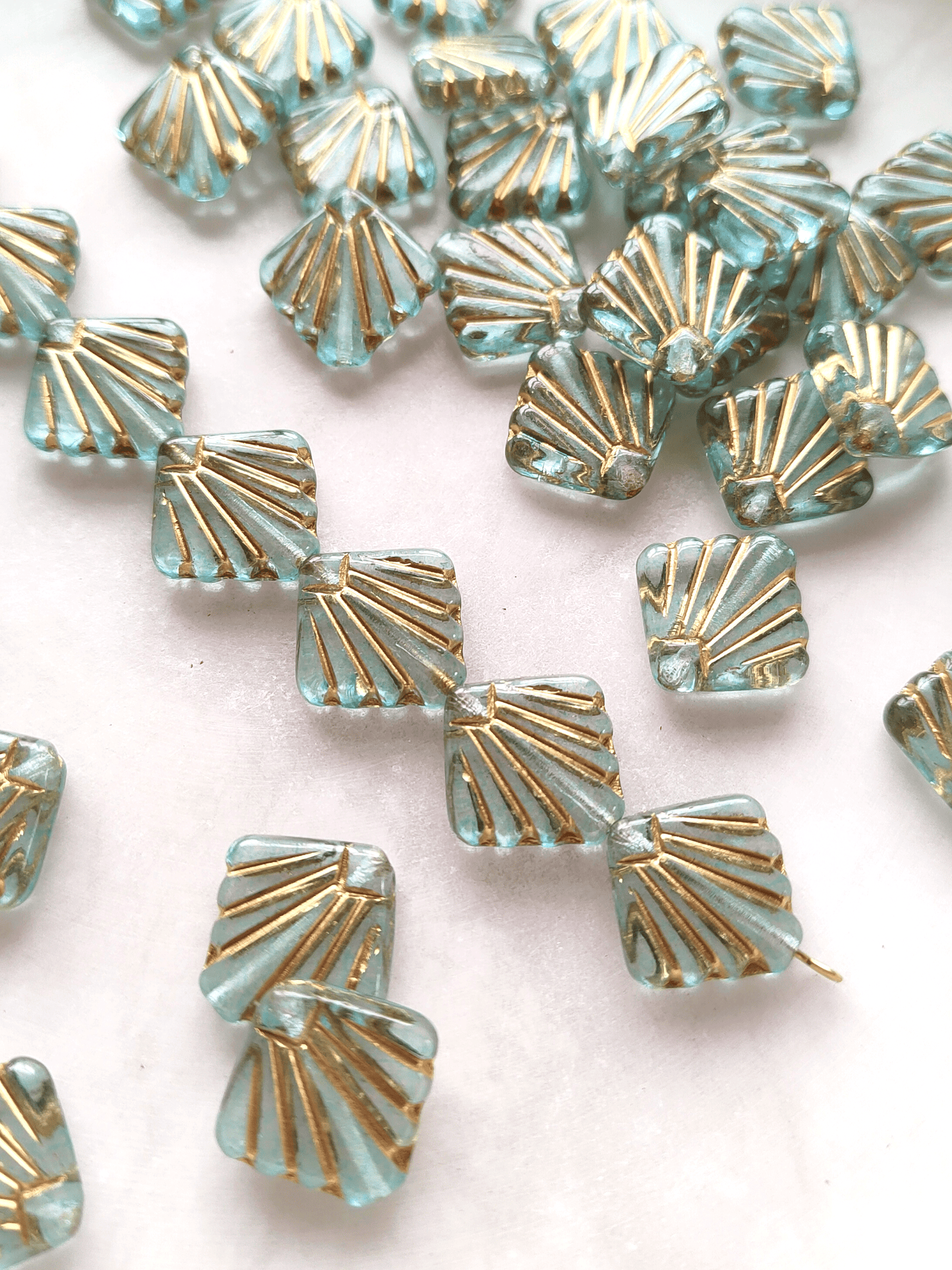 Fan ornament beads 17mm - sky blue & gold