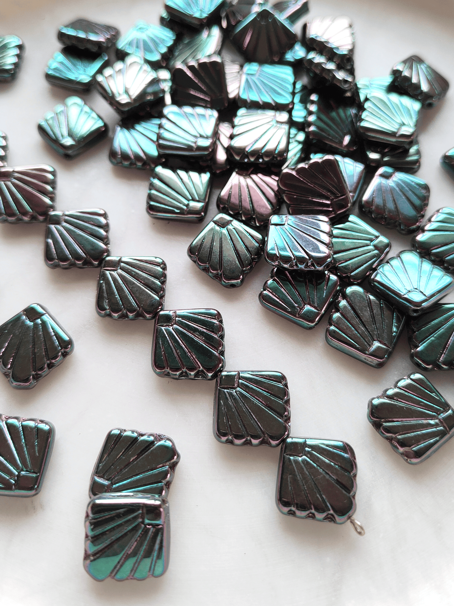 Fan ornament beads 17mm - metallic dark green & purple