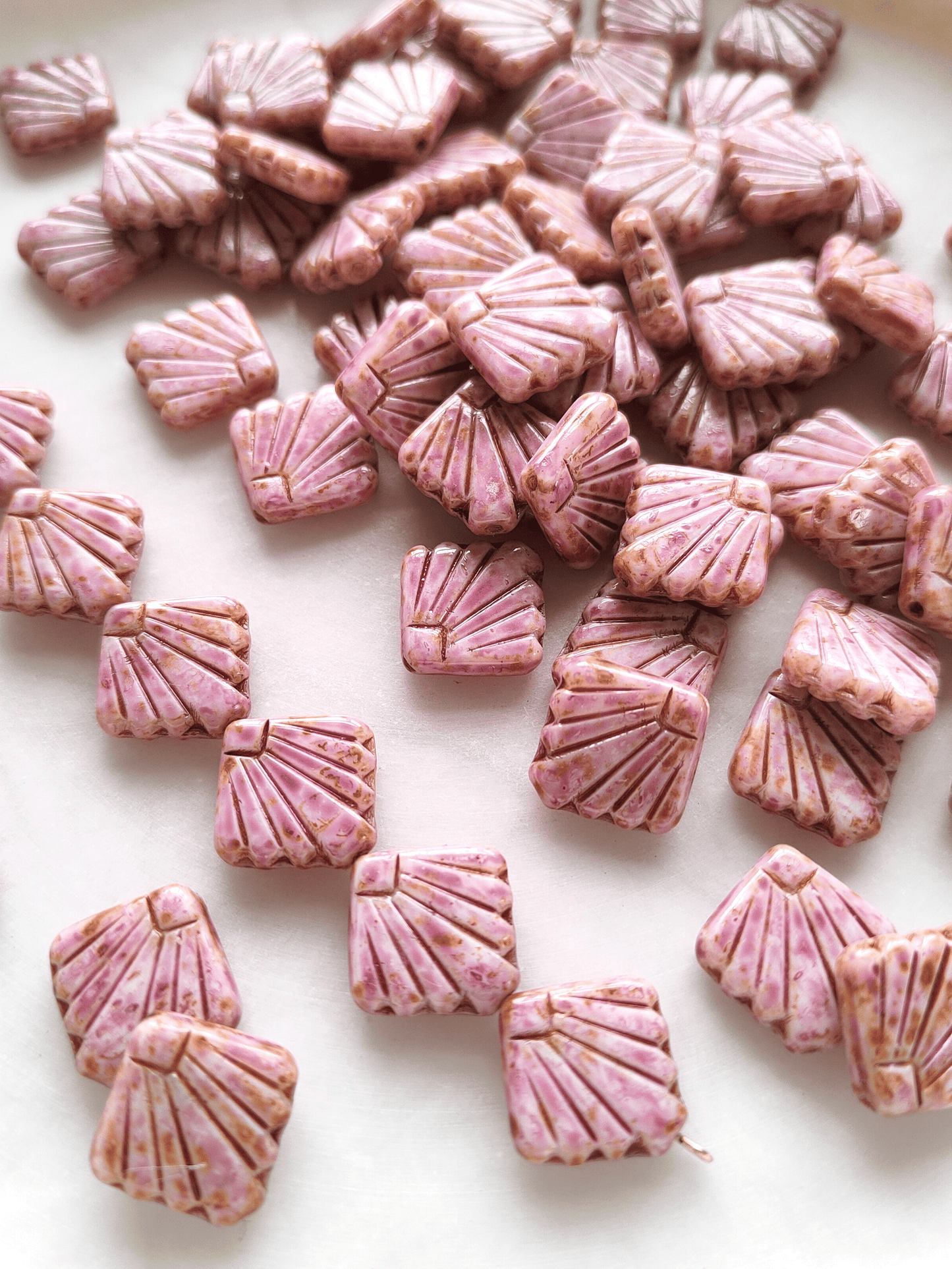 Fan ornament beads 17mm - light pink & brown speckled
