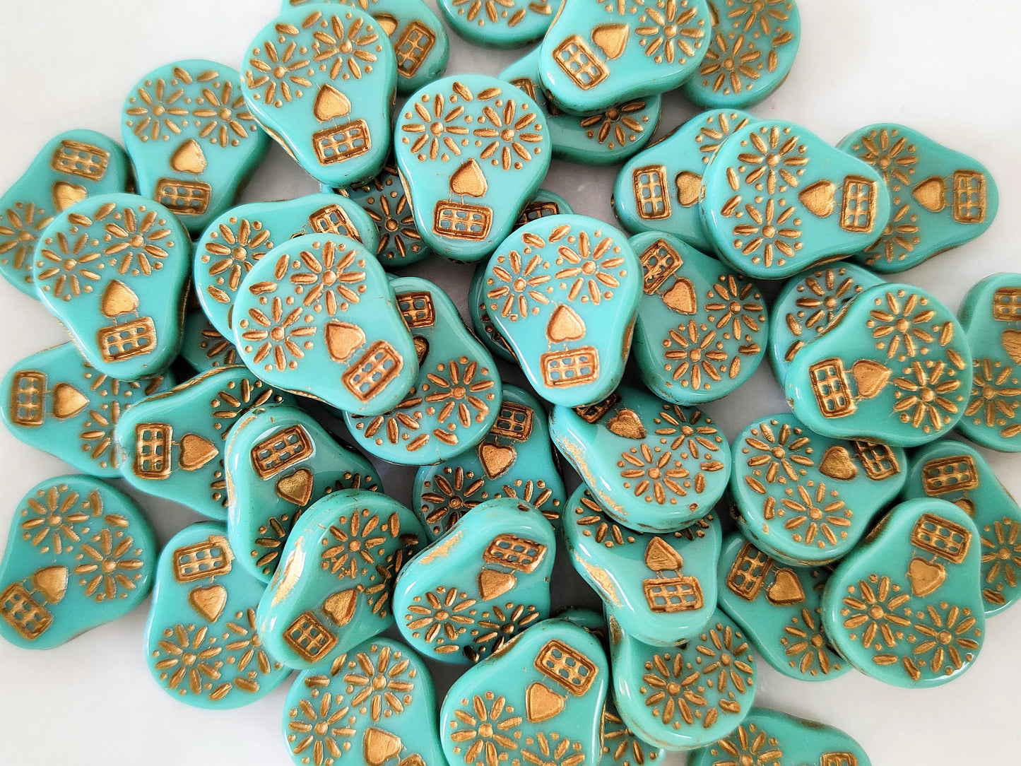 Totenköpfe 20x16mm - Grün & Gold