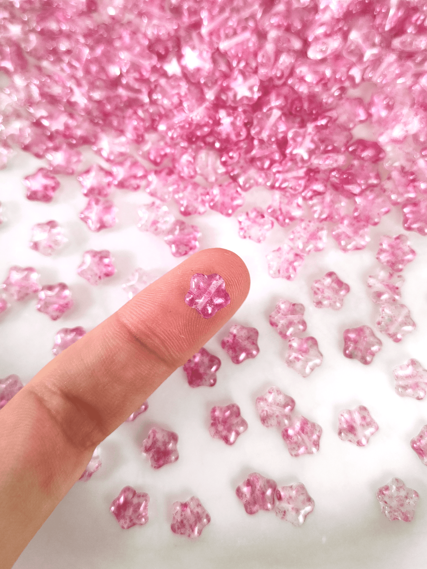 Sterne 8mm - Farblos & Pink gefleckt