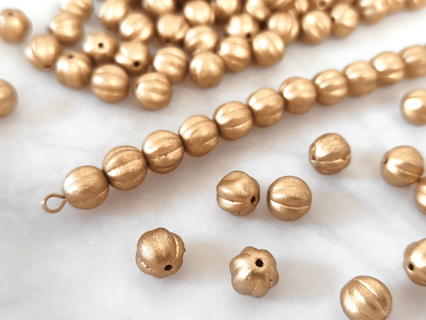 Melonen 8mm - matt Gold