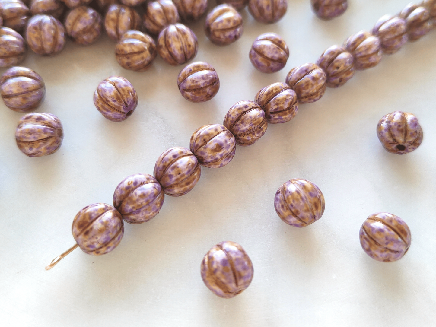 Melon beads 8mm - brown & purple speckled