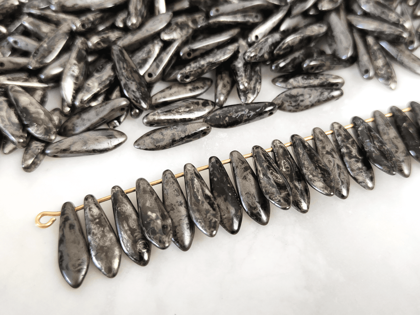 Dagger beads 5x16mm - black & silver patterning