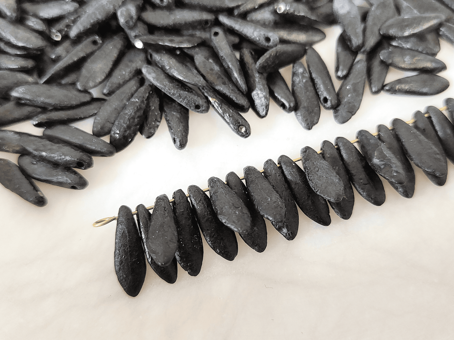 Dagger beads 5x16mm - black etched