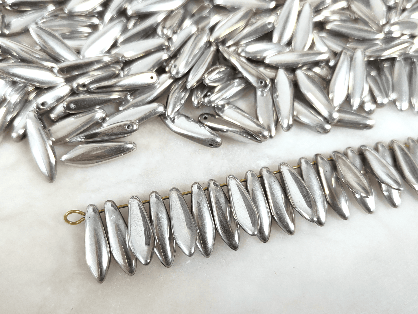 Dagger beads 5x16mm - shiny silver
