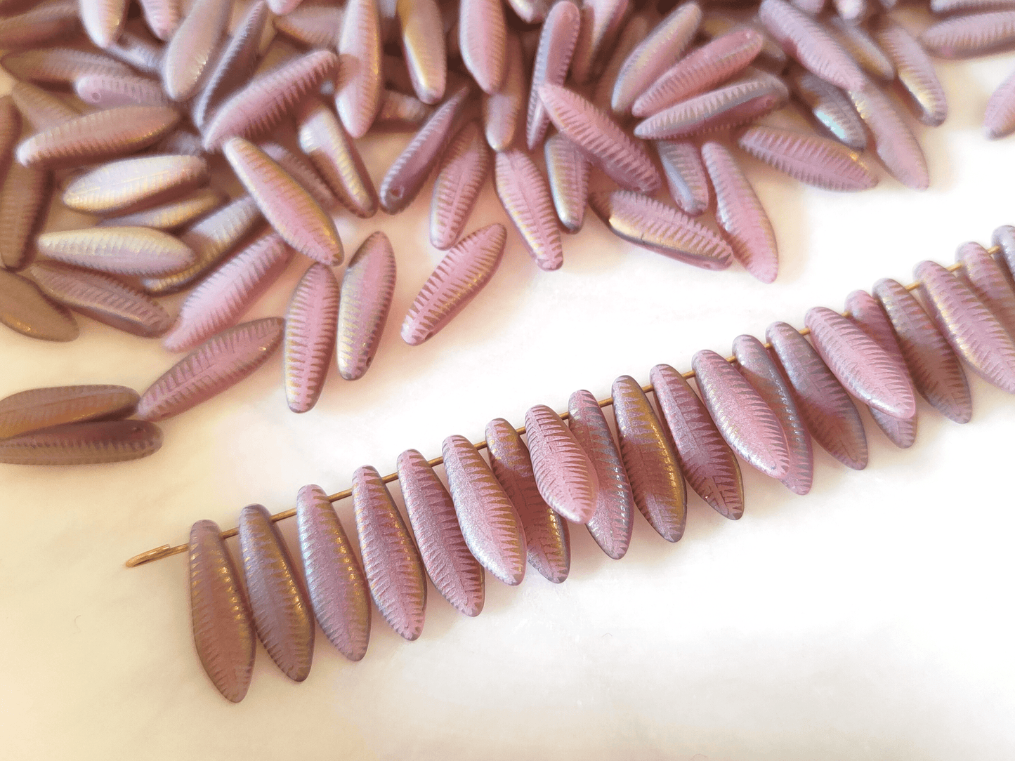 Dagger beads 5x16mm - dusty purple & iris feather motif