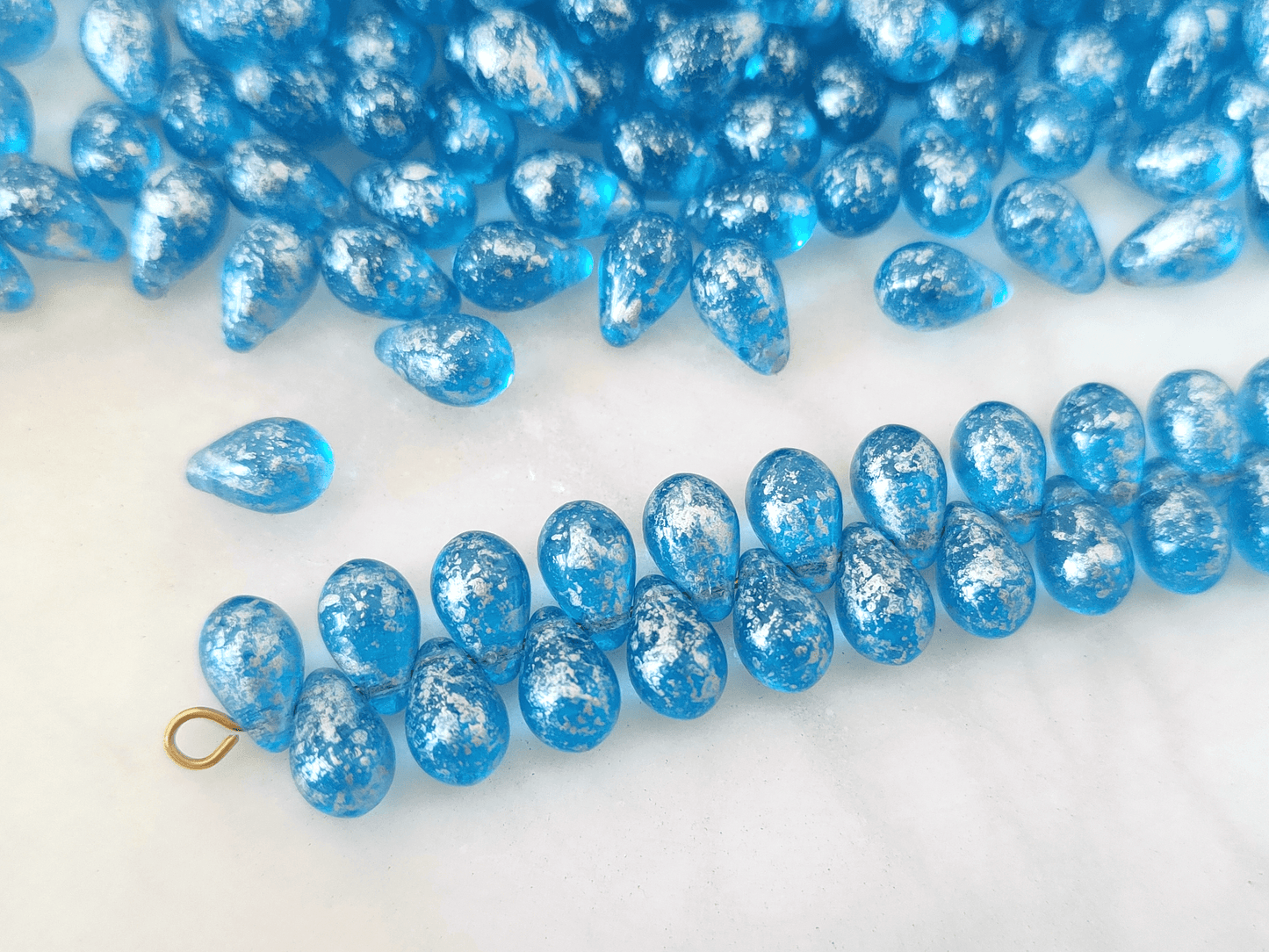 Tropfen 6x9mm - Blau & Silber gefleckt