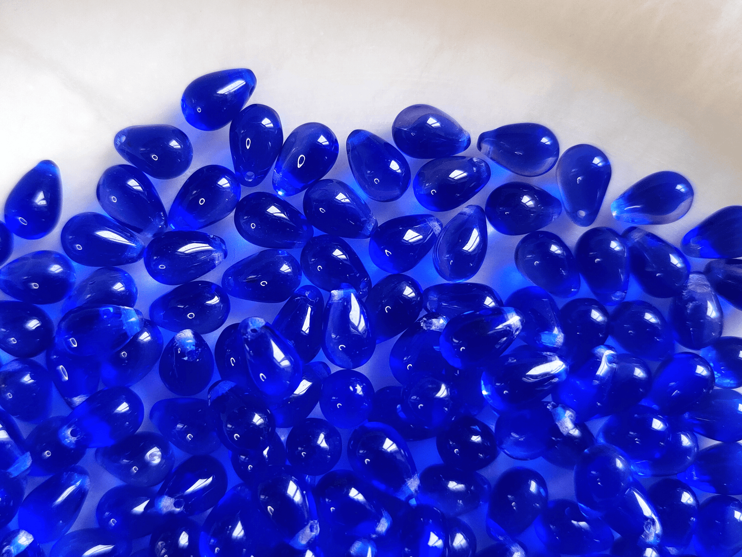Drop beads 6x9mm - dark royal blue & colorless
