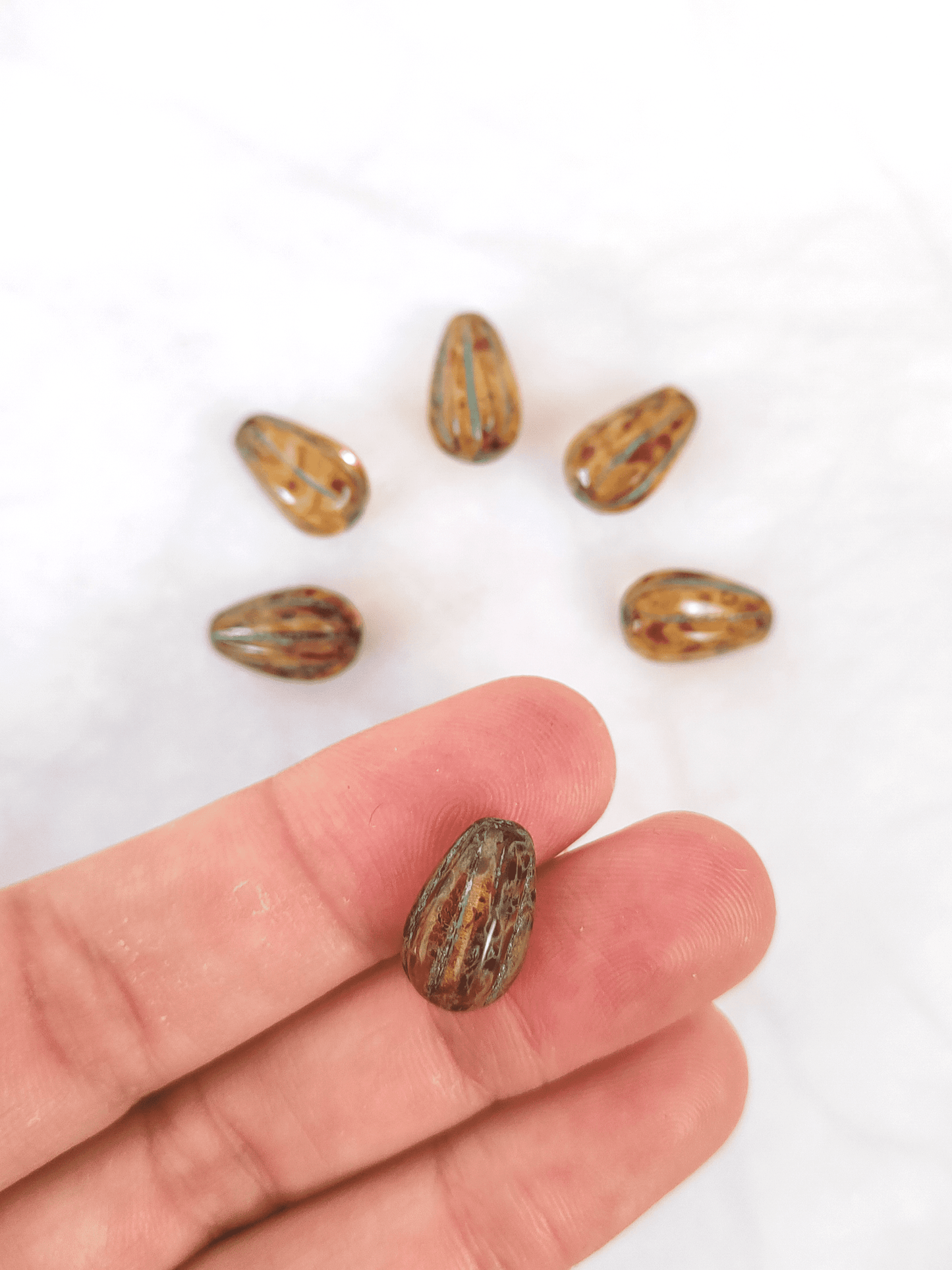 Melon drop beads 13x8mm - brown Picasso