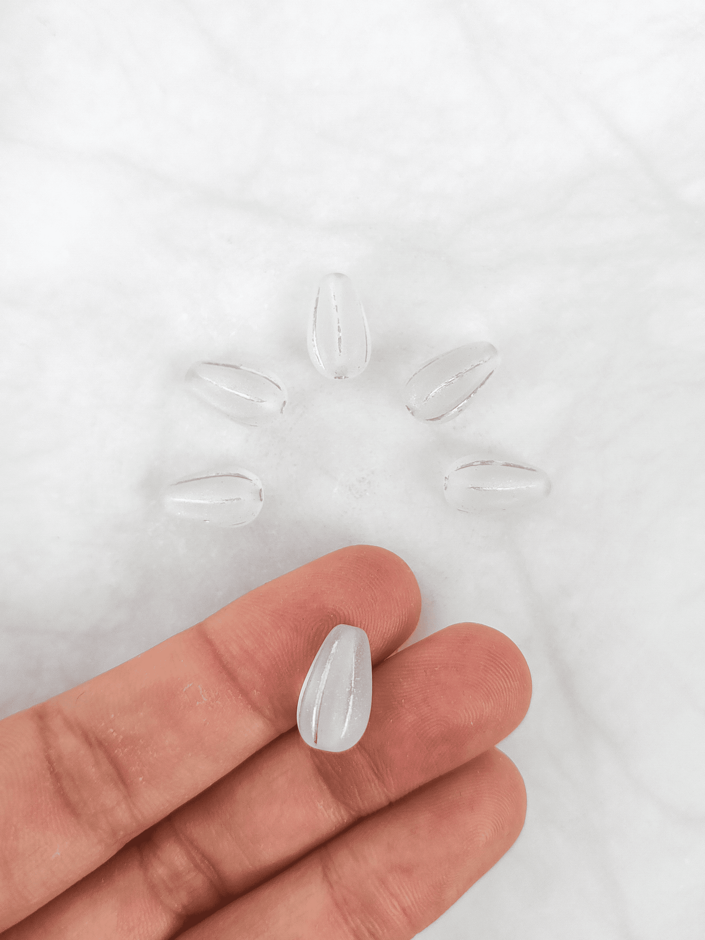 Melon drop beads 13x8mm - matt colorless & silver