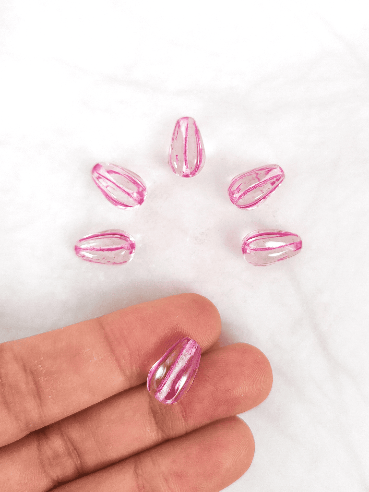 Melon drop beads 13x8mm - colorless & pink