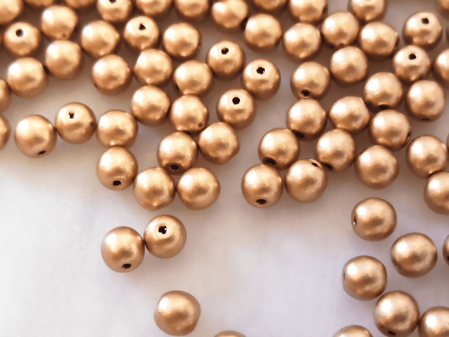 4mm round beads - matt gold