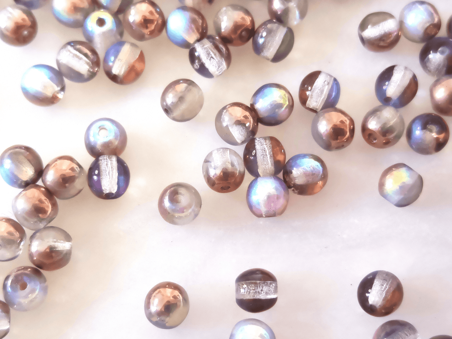 4mm round beads - colorless & copper AB
