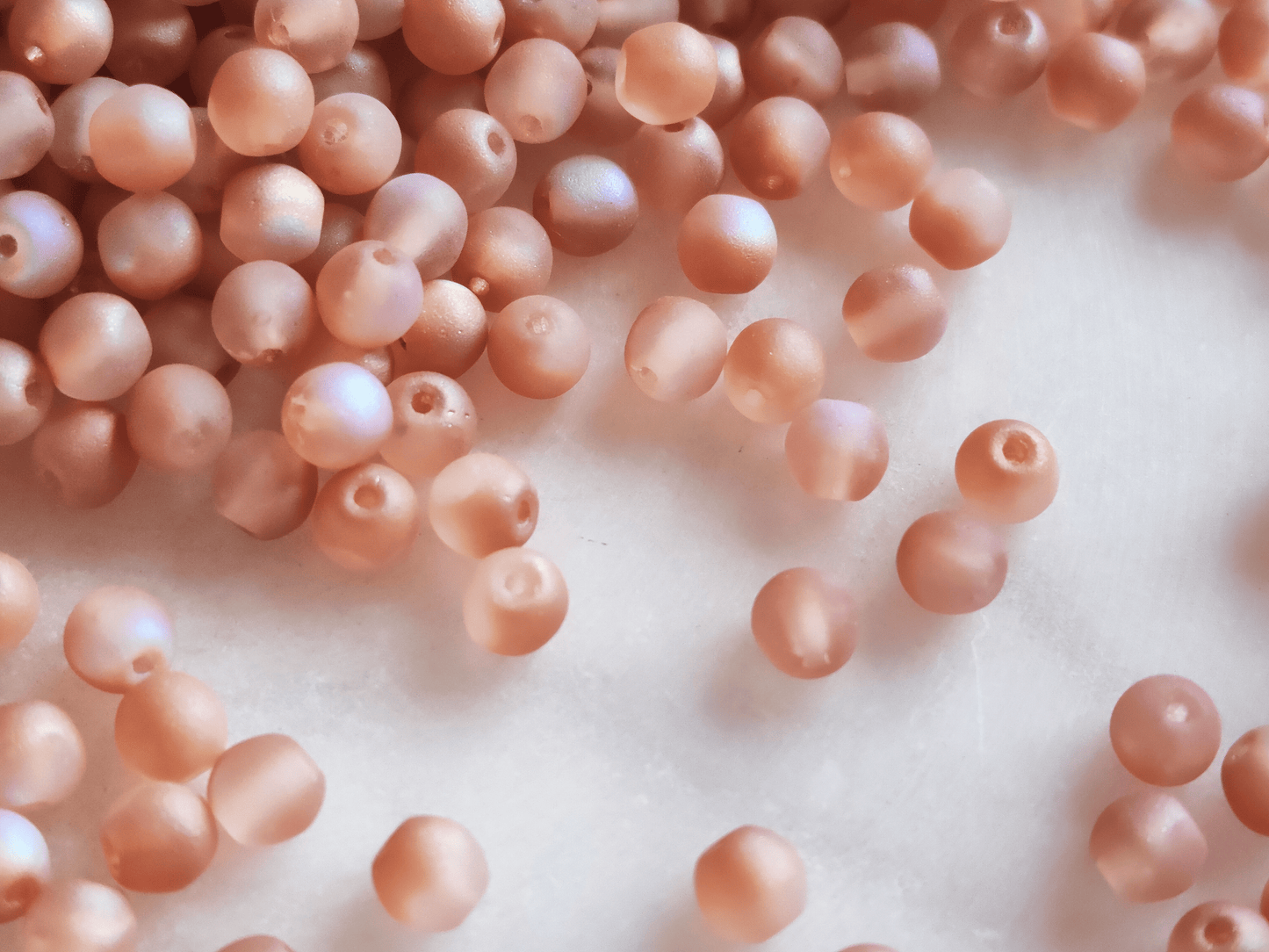 4mm round beads - matt muted orange iris