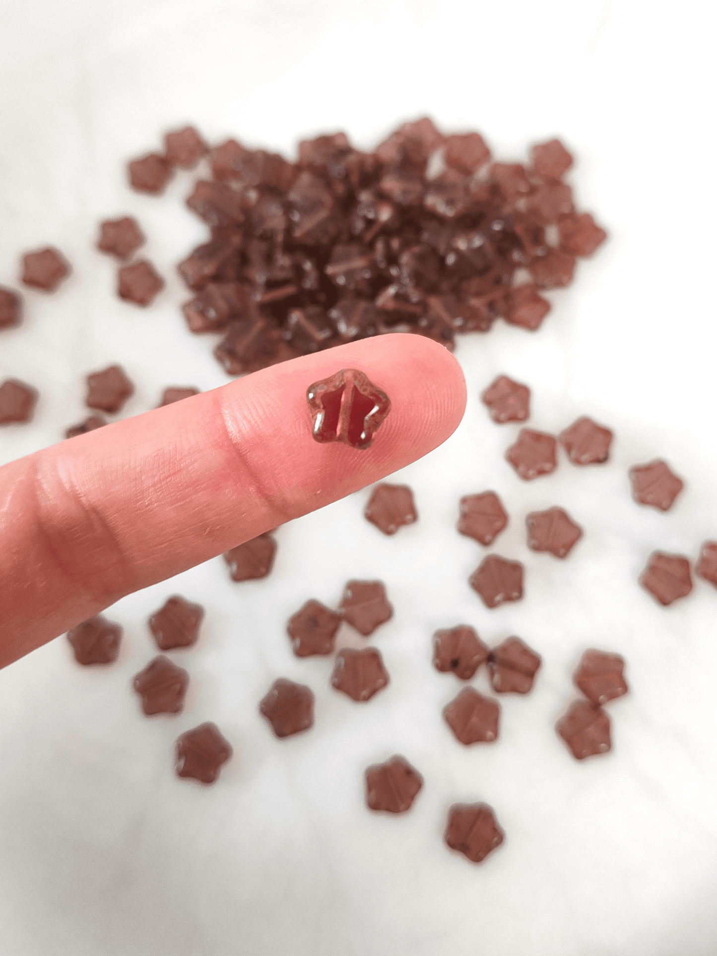 Sterne 8mm - gedecktes warmes Lila