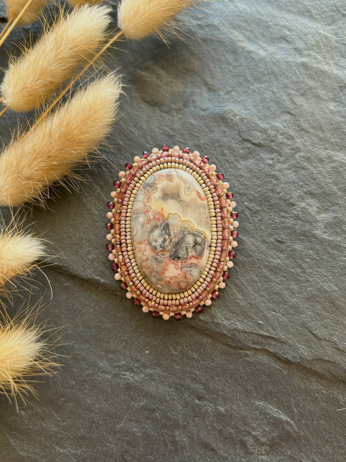 Agate brooch with rhodochrosite and garnet