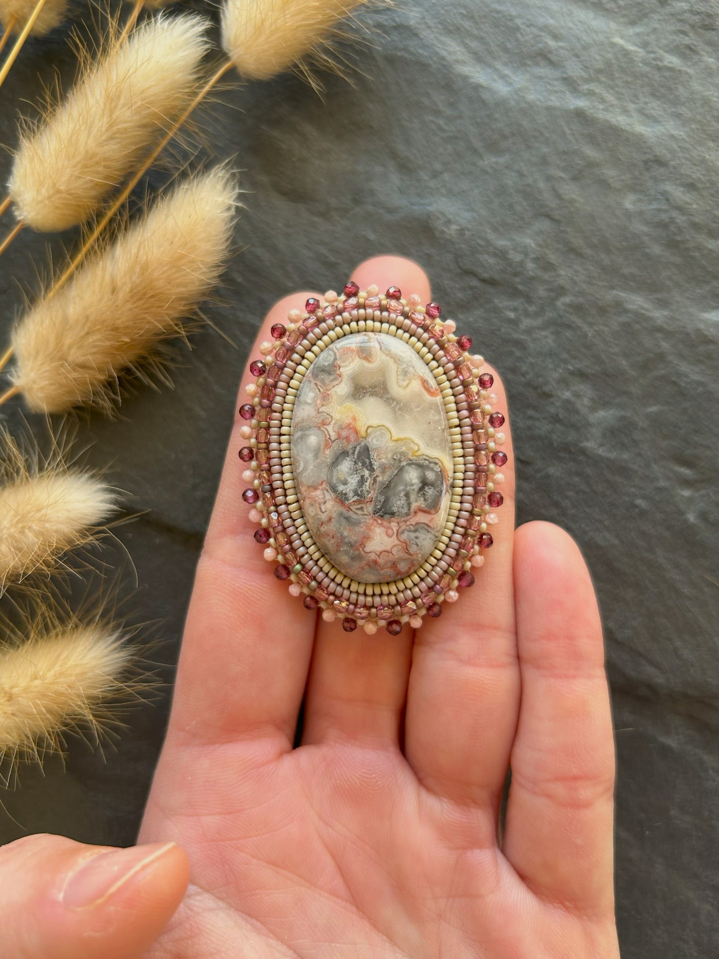 Agate brooch with rhodochrosite and garnet