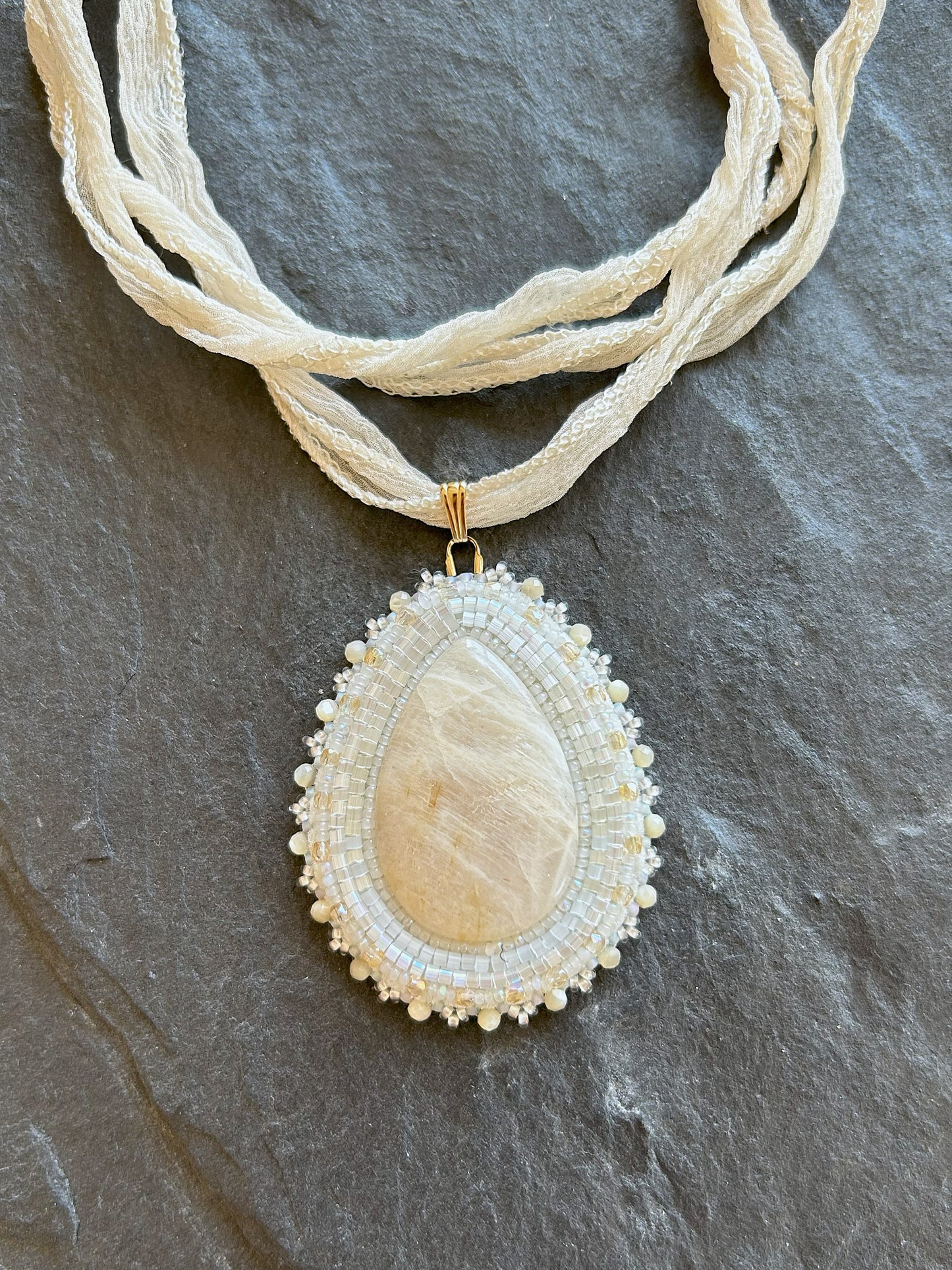Moonstone necklace pendant with mother of pearl beads