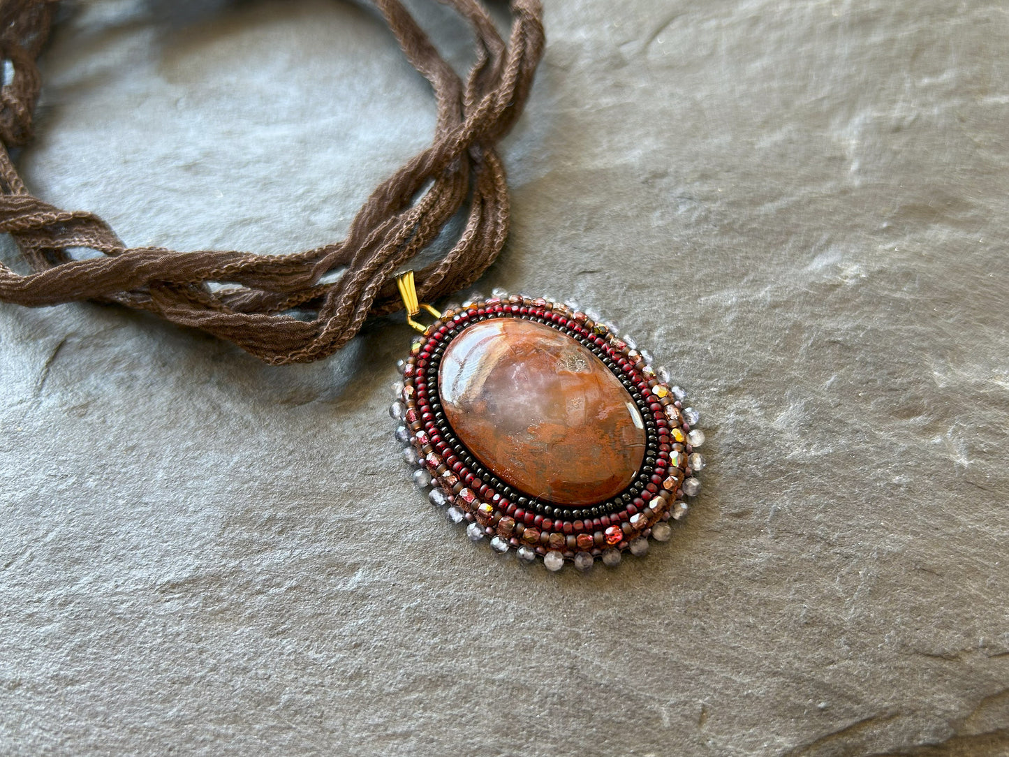 Brecciated jasper necklace pendant with water sapphire beads