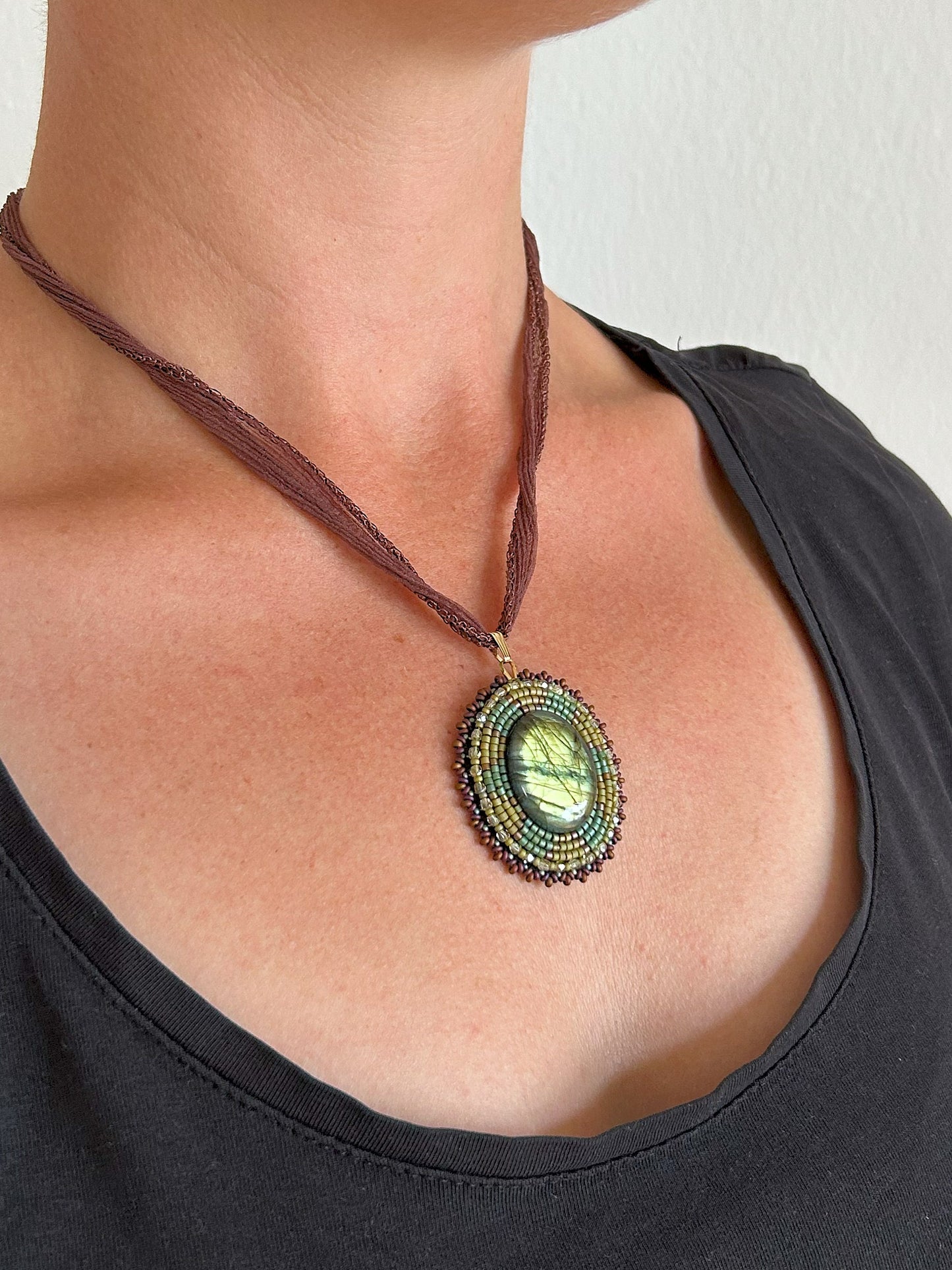 Iridescent labradorite necklace pendant with green fire