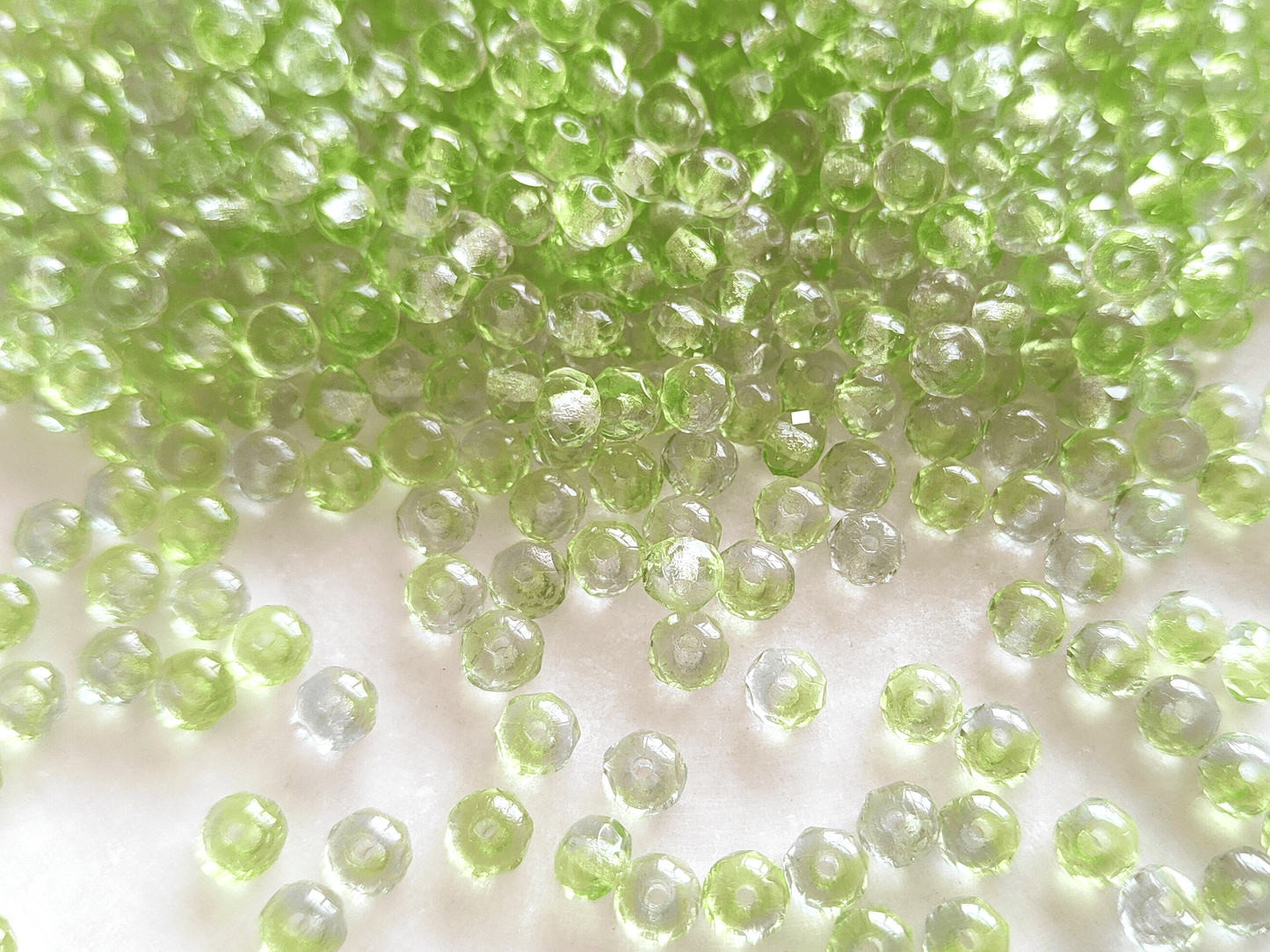 Faceted rondelle beads 3x5mm - light green & colorless