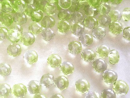 Faceted rondelle beads 3x5mm - light green & colorless