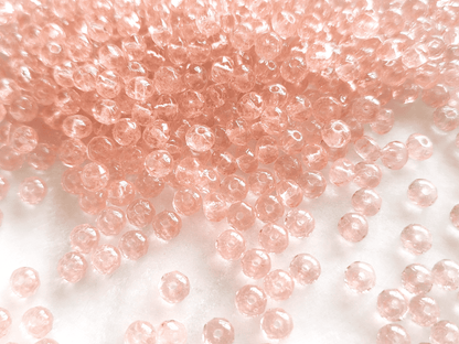 Faceted rondelle beads 3x5mm - warm light pink