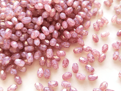 Faceted olive beads 4x6mm - purple & marbled