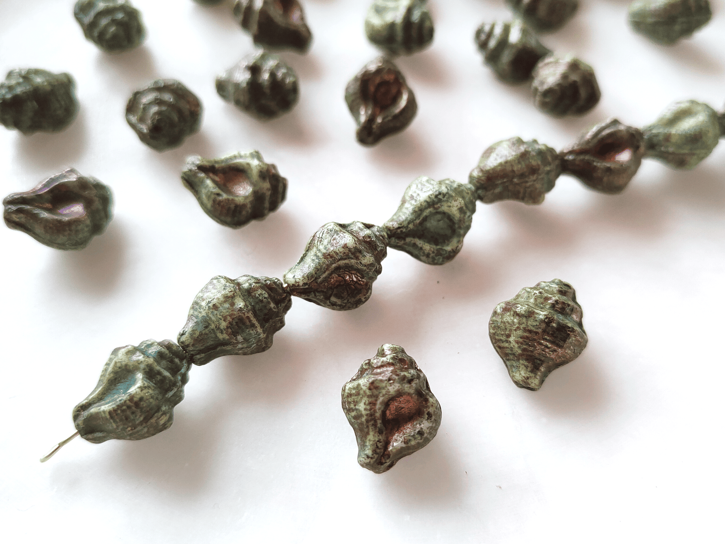 Murex shell beads 15x12mm - dark green & bronze