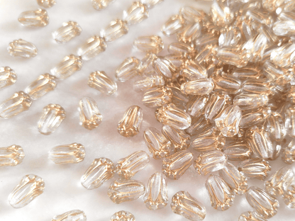 Tulip beads 12x8mm - colorless & gold