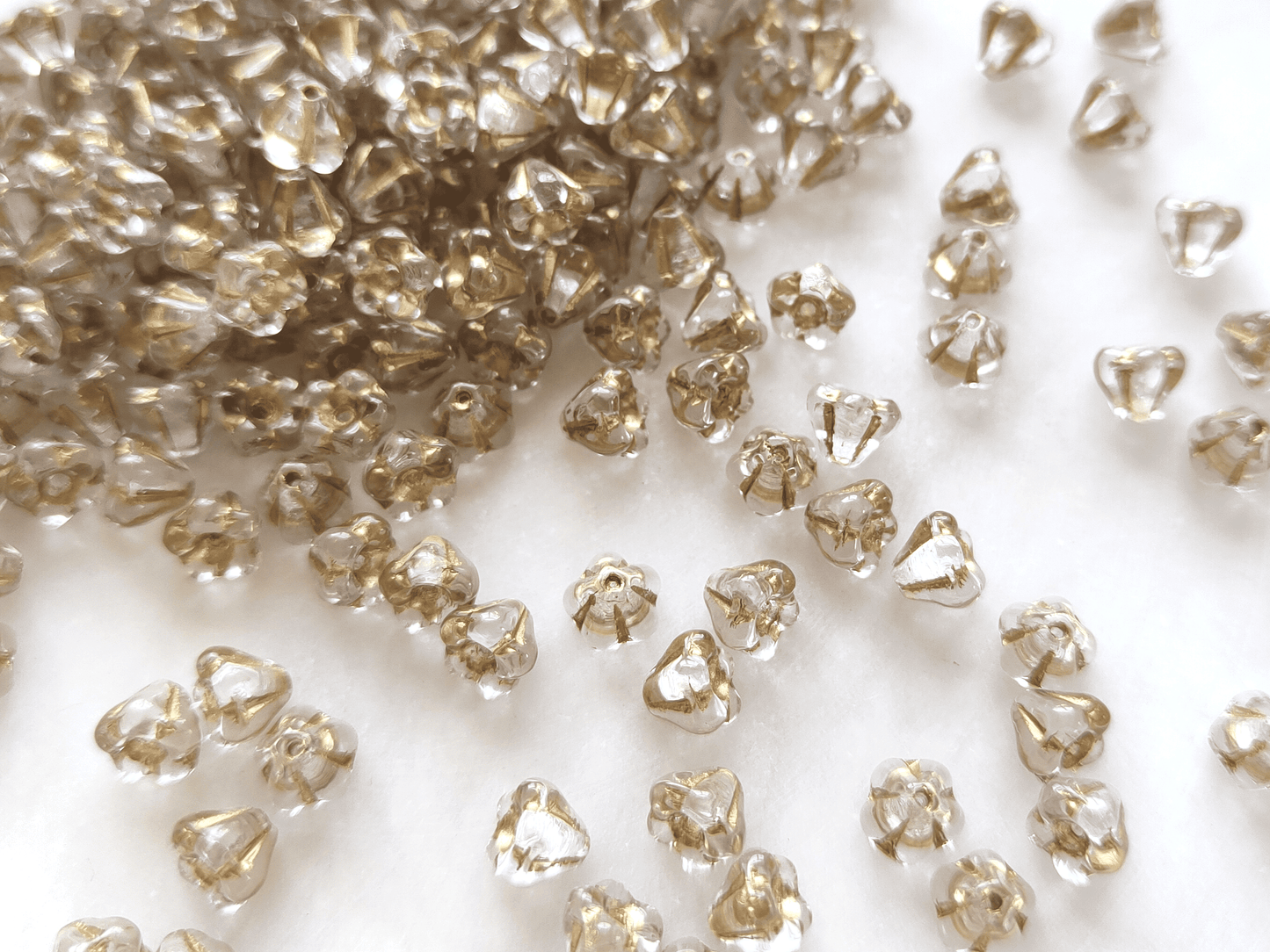 Bell flower beads 4x6mm - colorless & gold