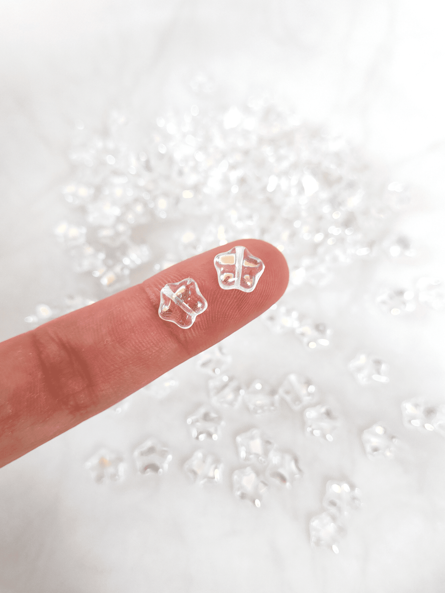 Star beads 8mm - colorless iris speckled