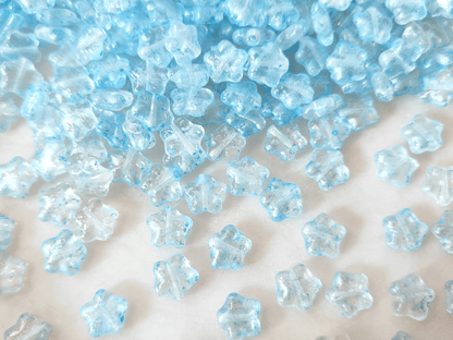 Star beads 8mm - colorless & light blue speckles