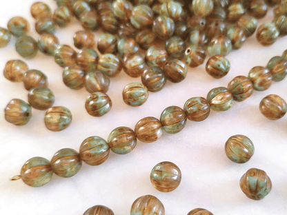 Melon beads 8mm - olive green & brown Picasso