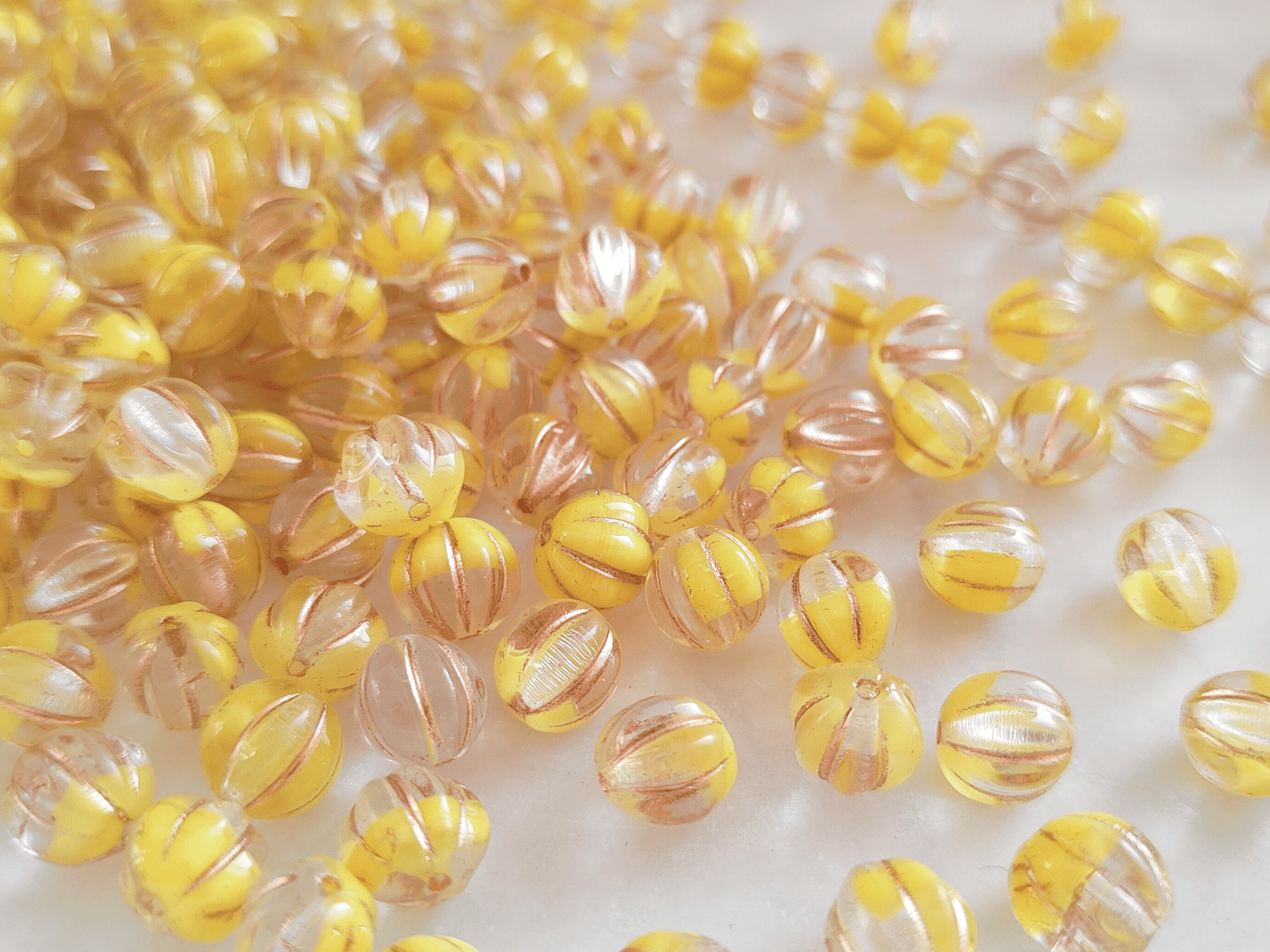 Melon beads 8mm - colorless, yellow & copper