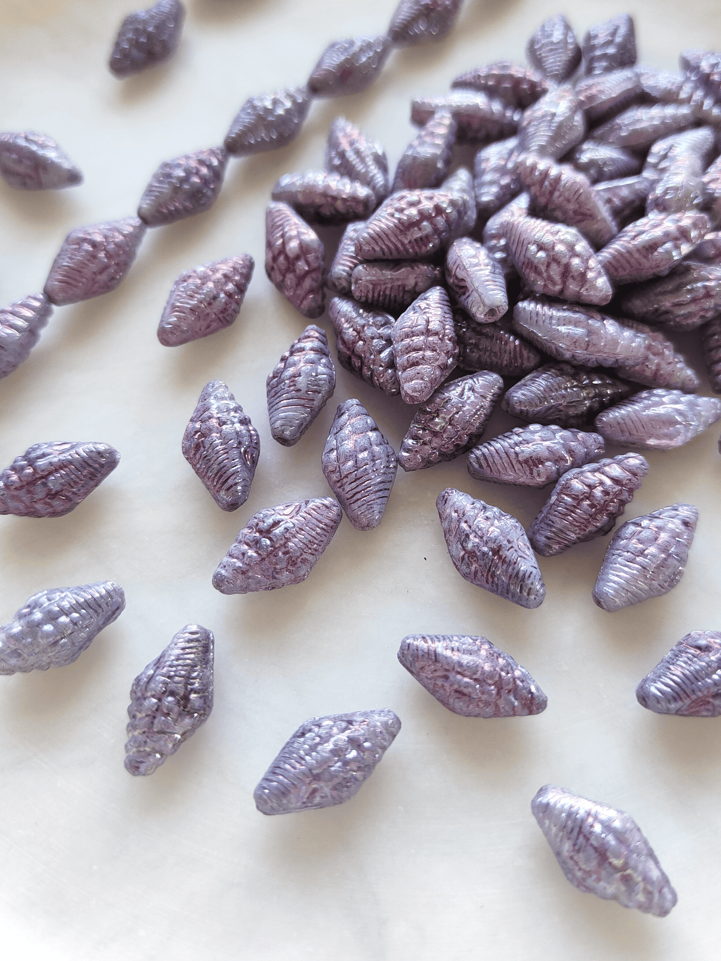 Miter shell beads 16x8mm - dusty purple