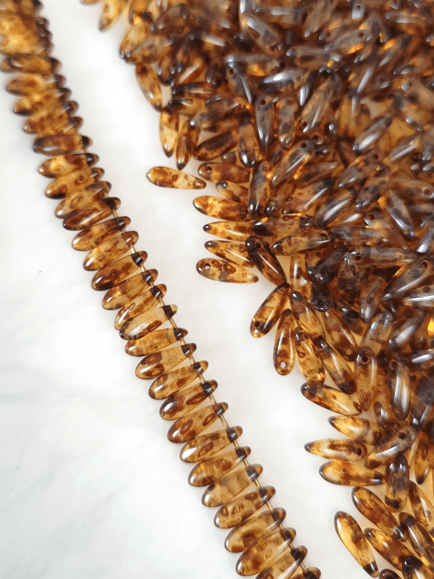 Dagger beads 3x11mm - brown Picasso