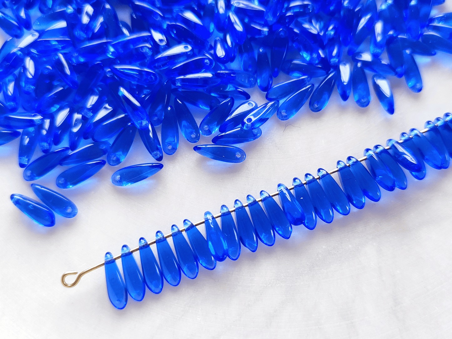 Dagger beads 3x11mm - royal blue