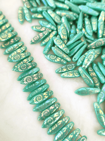 Dagger beads 5x16mm - turquoise & iris spiral motif