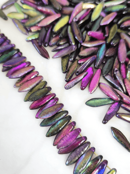 Dagger beads 5x16mm - dark rainbow etched