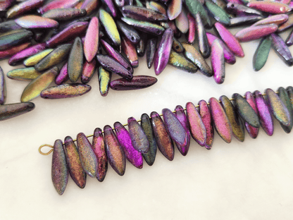 Dagger beads 5x16mm - dark rainbow etched
