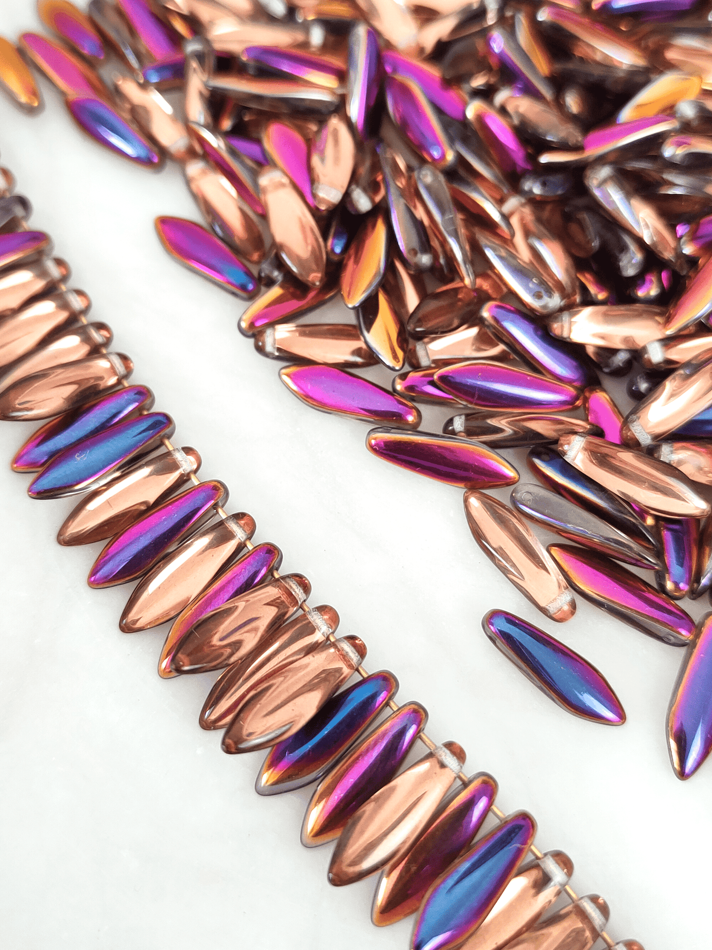 Dagger beads 5x16mm - copper & metallic purple