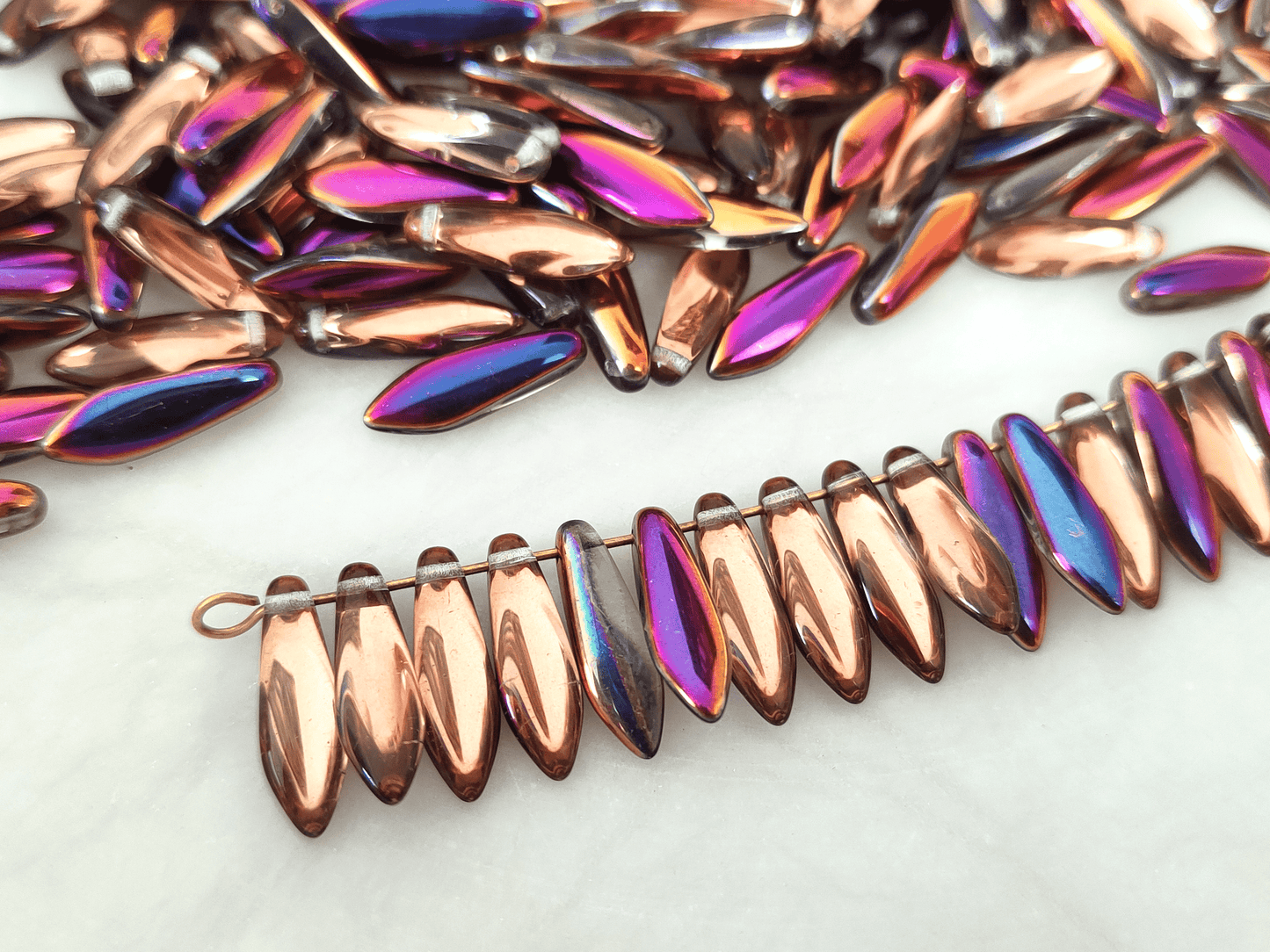 Dagger beads 5x16mm - copper & metallic purple
