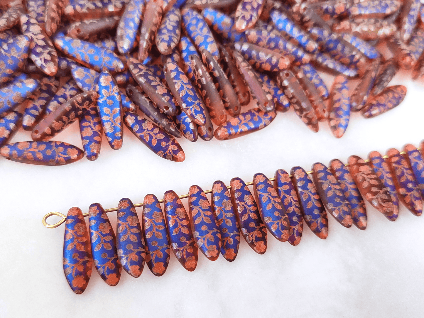 Dagger beads 5x16mm - red, blue & rose motif